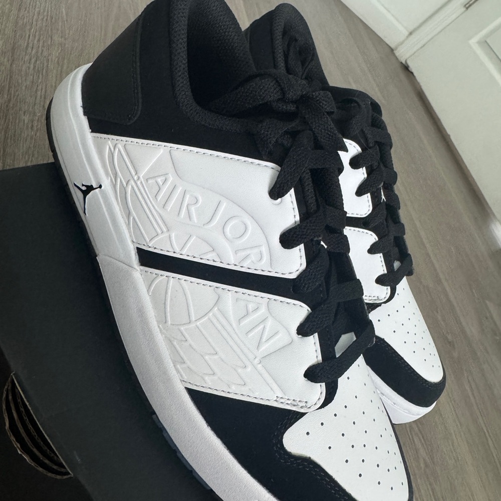 Jordan Nu Retro 1 Low Black and White Sneakers